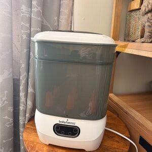 Baby Brezza Bottle Sterilizer in Gray and White